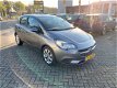 Opel Corsa - 1.4 16v 90 pk 5 deurs Online Edition - 1 - Thumbnail