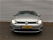 Volkswagen Golf - 1.0 TSI 110PK Comfortline Parkeerhulp navigatie Apple-carplay alarm - 1 - Thumbnail