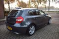 BMW 1-serie - 118i Business Line AIRCO/LEER/CRUISE/PDC/6 BAK/NETTE STAAT - 1 - Thumbnail