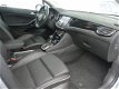 Opel Astra Sports Tourer - 1.4 150 pk Aut Innov Leder | Navigatie | Camera - 1 - Thumbnail