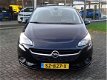 Opel Corsa - 1.4-16V 90pk 5-Drs Favourite Arconditioning Navigatie LM-Velgen Cruisecontrol Mistlampe - 1 - Thumbnail