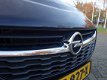 Opel Corsa - 1.4-16V 90pk 5-Drs Favourite Arconditioning Navigatie LM-Velgen Cruisecontrol Mistlampe - 1 - Thumbnail