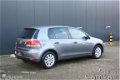 Volkswagen Golf - 1.2 TSI Tour II / CLIMATRONIC / NAVIGATIE / LM. VELGEN / ZEER NET - 1 - Thumbnail