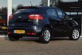 Kia Rio - 1.2 CVVT Comfort Pack 5 drs 1e eig - 1 - Thumbnail