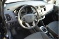 Kia Rio - 1.2 CVVT Comfort Pack 5 drs 1e eig - 1 - Thumbnail