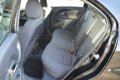 Kia Rio - 1.2 CVVT Comfort Pack 5 drs 1e eig - 1 - Thumbnail