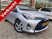 Toyota Yaris - 1.5 Hybrid Trend NL auto Navi/Cruise - 1 - Thumbnail