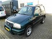 Suzuki Grand Vitara - 2.0 Metal Top , 4x4, lage km.stand nap - 1 - Thumbnail