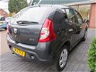 Dacia Sandero - 1.2 Lauréate | airco | garantie | 2x nw.band | APK 22-11-2020 - 1 - Thumbnail