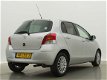 Toyota Yaris - 5-drs 1.3 Dynamic | LM-Velgen | Airco | Bluetooth | - 1 - Thumbnail