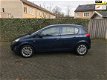 Opel Corsa - 1.2-16V Cosmo 1e eigenaar half leder - 1 - Thumbnail