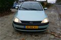 Opel Corsa - 1.2-16V Comfort RIJDT GEWELDIG MET APK - 1 - Thumbnail