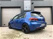 Volkswagen Golf - 2.0 R 4-Motion DSG 5-drs Navi Cruise dYnaudio PDC Stoelverwarming - 1 - Thumbnail