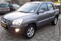 Kia Sportage - 2.7 V6 Adventure 4WD 5 Drs Airco/clima.Cruise. Hoge zit.LM Velgen. Lage km stand.Came - 1 - Thumbnail