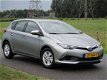 Toyota Auris - 1.8 Hybrid Now Aut/ECC/Navigatie/PDC/Garantie - 1 - Thumbnail