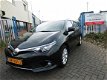 Toyota Auris Touring Sports - 1.8 Hybrid Lease PANORAMADAK / BTW AUTO / NAVI / NAP - 1 - Thumbnail