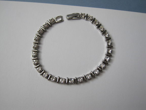 Armband zilverkleurig tennis model met kristal rijnsteentjes 18.2 cm. - Afbeelding 8