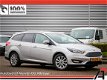 Ford Focus Wagon - 1.0 First Edition , Half Leer, Navi, Bluetooth, Stoelverwarming - 1 - Thumbnail