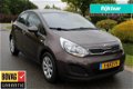 Kia Rio - 1.2 86pk Comfort Pack airco/start-stop/26.446km 5-drs - 1 - Thumbnail