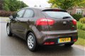 Kia Rio - 1.2 86pk Comfort Pack airco/start-stop/26.446km 5-drs - 1 - Thumbnail