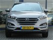 Hyundai Tucson - 1.6 GDi Comfort Navigatie / Parkeersensoren + Camera / Stoelverwarming - 1 - Thumbnail