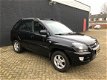 Kia Sportage - 2.0 CVVT X-ecutive // LPG // AIRCO // CRUISE CONTROL // - 1 - Thumbnail