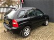 Kia Sportage - 2.0 CVVT X-ecutive // LPG // AIRCO // CRUISE CONTROL // - 1 - Thumbnail