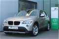 BMW X1 - 2.0i sDrive / Automaat / Trekhaak - 1 - Thumbnail