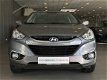 Hyundai ix35 - 1.6i GDI 135pk Handgeschakeld Voorruit verwarming/ Auto Airco - 1 - Thumbnail