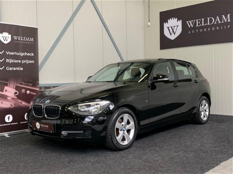 BMW 1-serie - 116I Sport PDC Dealeronderh. Rijklaar - 1