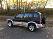 Suzuki Grand Vitara - 2.0 TDi AIRCO 4X4 RIJDT SUPERNETTE AUTOTREKHAAKWEINIG KM:148000NAP2 SLEUTELS - 1 - Thumbnail