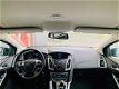 Ford Focus Wagon - 1.0 EcoBoost Titanium, ParkAssist, 2jaar APK - 1 - Thumbnail