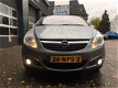 Opel Corsa - 1.4-16V COSMO, Clima, Half leer, NAP - 1 - Thumbnail