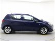 Opel Corsa - 1.4i 16v 90pk AUTOMAAT 5drs Edition | AIRCO | CRUISE | LMV - 1 - Thumbnail