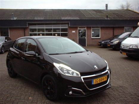 Peugeot 208 - 1.2 PureTech Blue Lion pdc achter navie lm velgen - 1