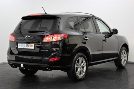 Hyundai Santa Fe - 2.4i 175pk CVVT Style *Trekgewicht 2000kg* | Navigatie | Leder | Trekhaak | Camer - 1