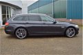 BMW 5-serie Touring - 3.0D High Exe 299pk *NaviPro, Leder, Xenon, Clima - 1 - Thumbnail