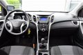 Hyundai i30 - 1.6 GDI i-Drive Cool Plus NAVI/CRUISE/AIRCO - 1 - Thumbnail