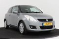 Suzuki Swift - 1.2 Comfort | Airco | Netjes - 1 - Thumbnail