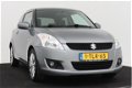 Suzuki Swift - 1.2 Comfort | Airco | Netjes - 1 - Thumbnail