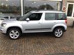 Skoda Yeti Outdoor - 1.2 TSI Ambition / AIRCO/CRUISE CONTROL/ TREKHAAK - 1 - Thumbnail