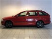 Skoda Octavia - (J) 1.9 TDI Aut Ambiente Attractive [ FM Navi Clima Cruise LMV Trekhaak ] - 1 - Thumbnail