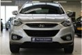 Hyundai ix35 - 1.6i GDI Blue 135pk StyleVersion PANORAMADAK / LM VELGEN / - 1 - Thumbnail