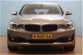 BMW 3-serie Gran Turismo - 320i High Executive AUTOMAAT climate leer navi lmv pdc - 1 - Thumbnail