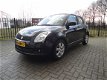 Suzuki Swift - 1.3 Comfort met airco - 1 - Thumbnail