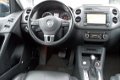 Volkswagen Tiguan - 2.0 TSI Sport&Style 4Motion | panoramadak | leer-pakket | xenon | automaat | - 1 - Thumbnail