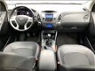 Hyundai ix35 - 1.6i GDI Blue 135pk Style | Navigatie | Lichtmetaal | Climate Control - 1 - Thumbnail