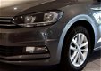 Volkswagen Touran - 1.2 TSI 105pk Comfortline 7p, Navi, trekhaak - 1 - Thumbnail