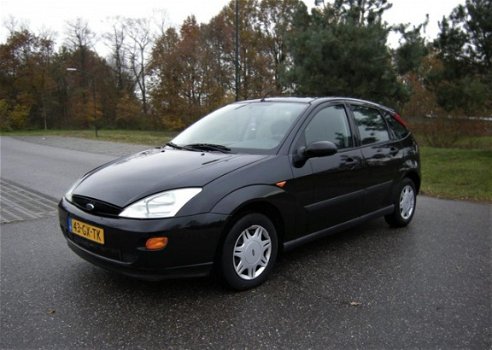 Ford Focus - 1.4-16V Trend ...koppeling slipt een beetje - 1