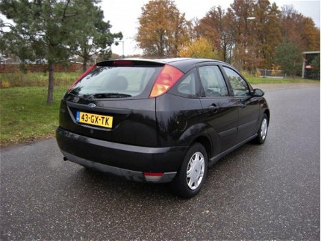 Ford Focus - 1.4-16V Trend ...koppeling slipt een beetje - 1